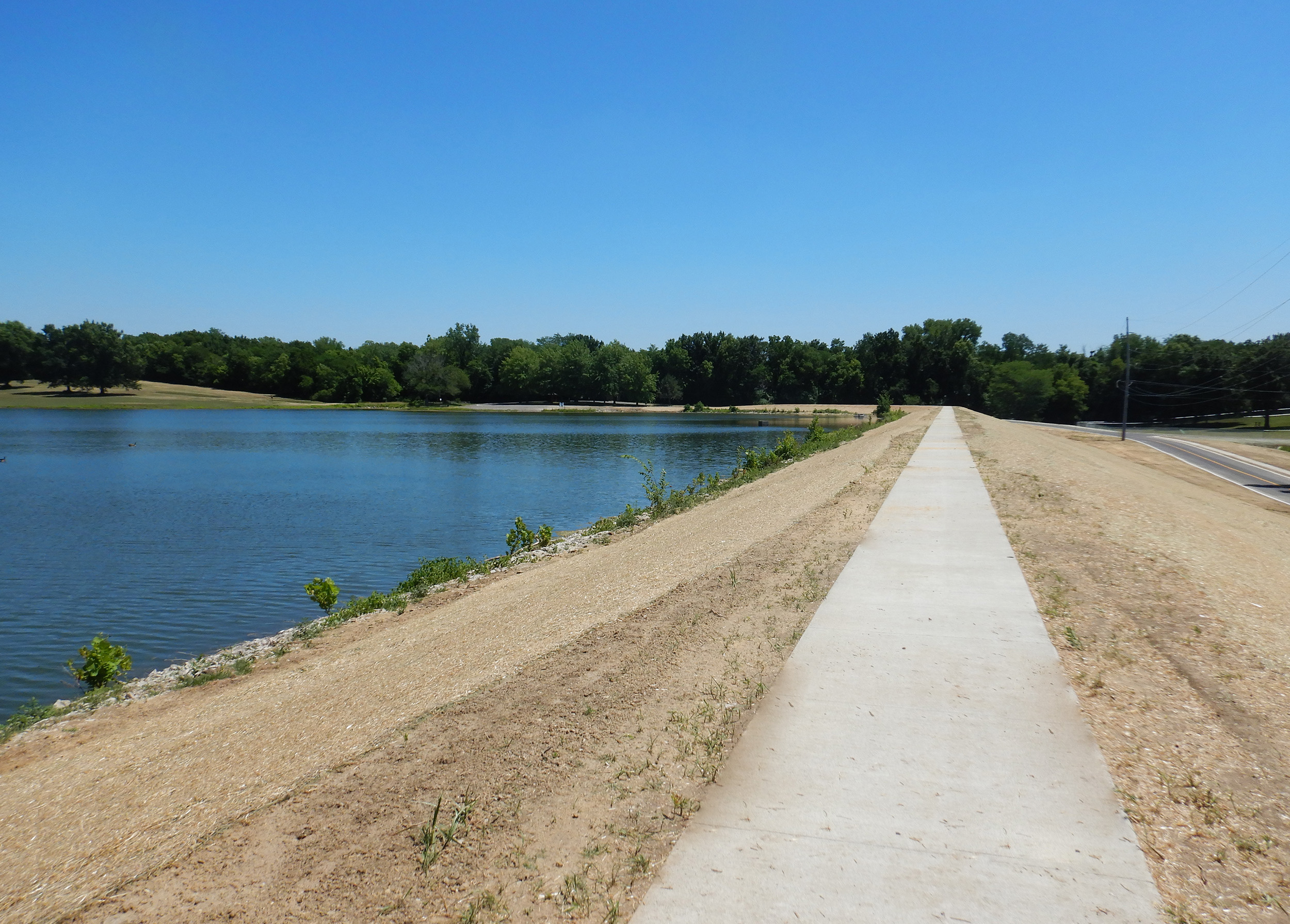 The project encompassed environmental studies, geotechnical investigations, and field surveys, illustrating a holistic approach to safeguarding the community and maintaining or enhancing the amenities in the Harrisonville City Park.