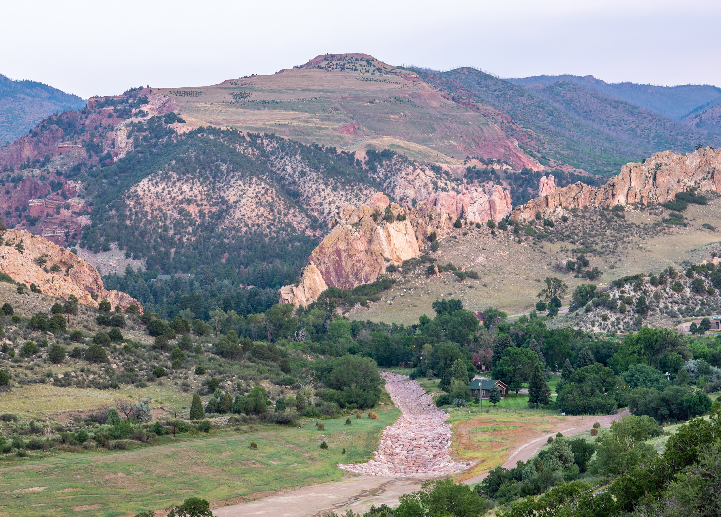 A new dam for stormwater detention and sediment collection in the far northeastern portion of Garden of the Gods will now store 169 acre-feet.