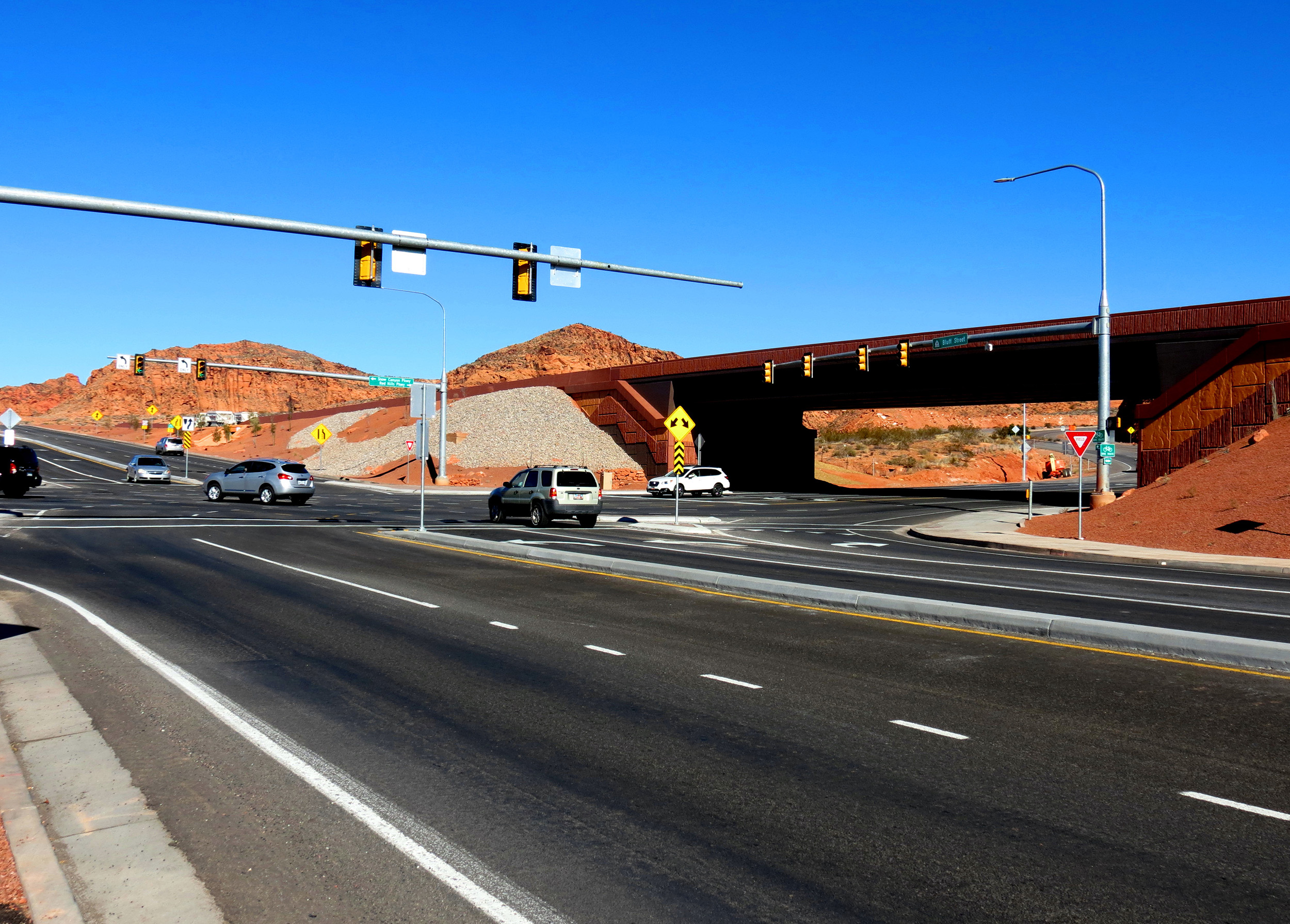 The project uses a Center-exit Interchange which lowers the project costs by utilizing existing pavement and increases safety for pedestrians and trail users.