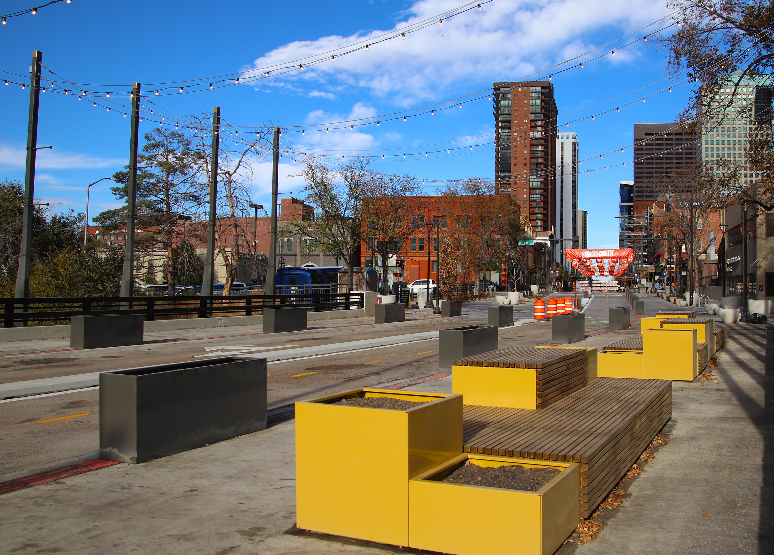 The City and County of Denver (CCD) has repurposed space on the bridge over Cherry Creek to provide a wider pedestrian/bicycle area informally.