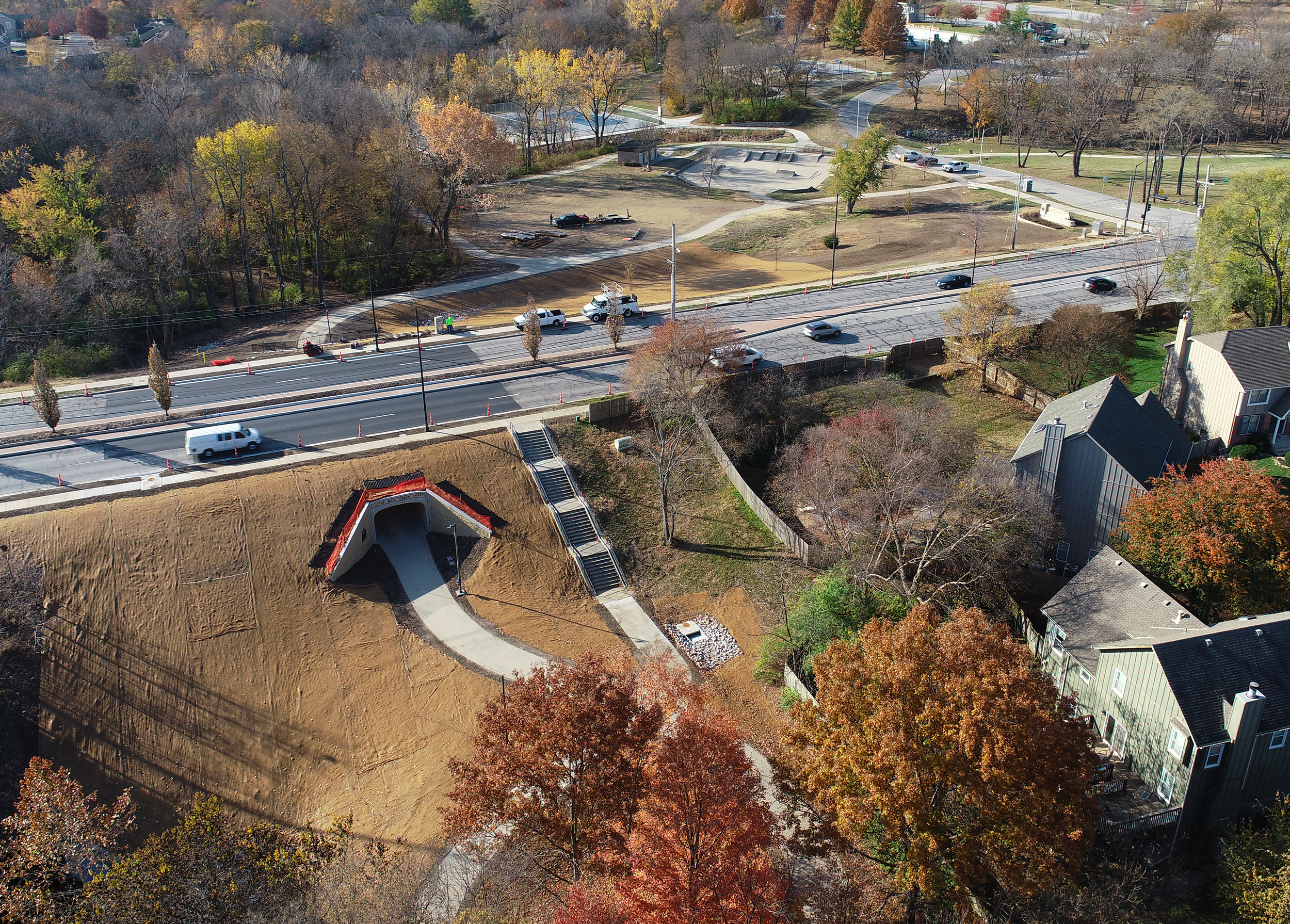 The Little Mill Creek Trail crossing provides pedestrian and cyclist-friendly access to Sar-Ko-Par Park under 87th Street.