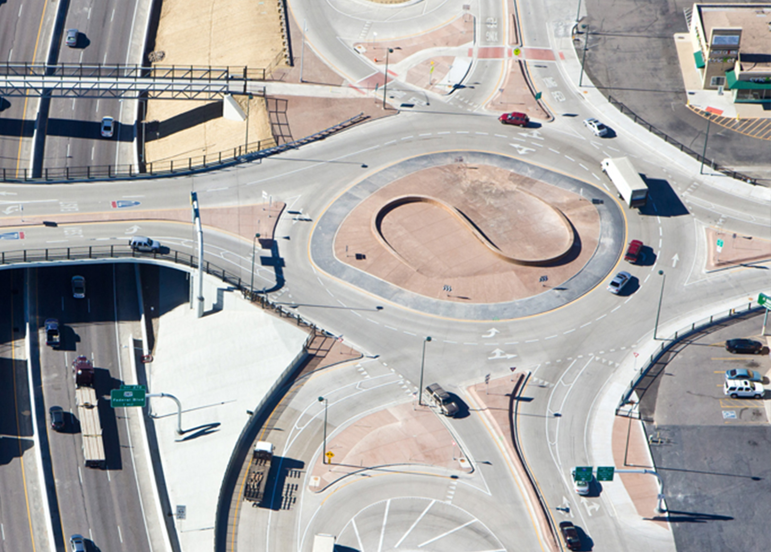 This project reconstructed the Pecos Street Bridge over I-70 and the interchange into modern roundabouts at the ramp intersections with Pecos Street.