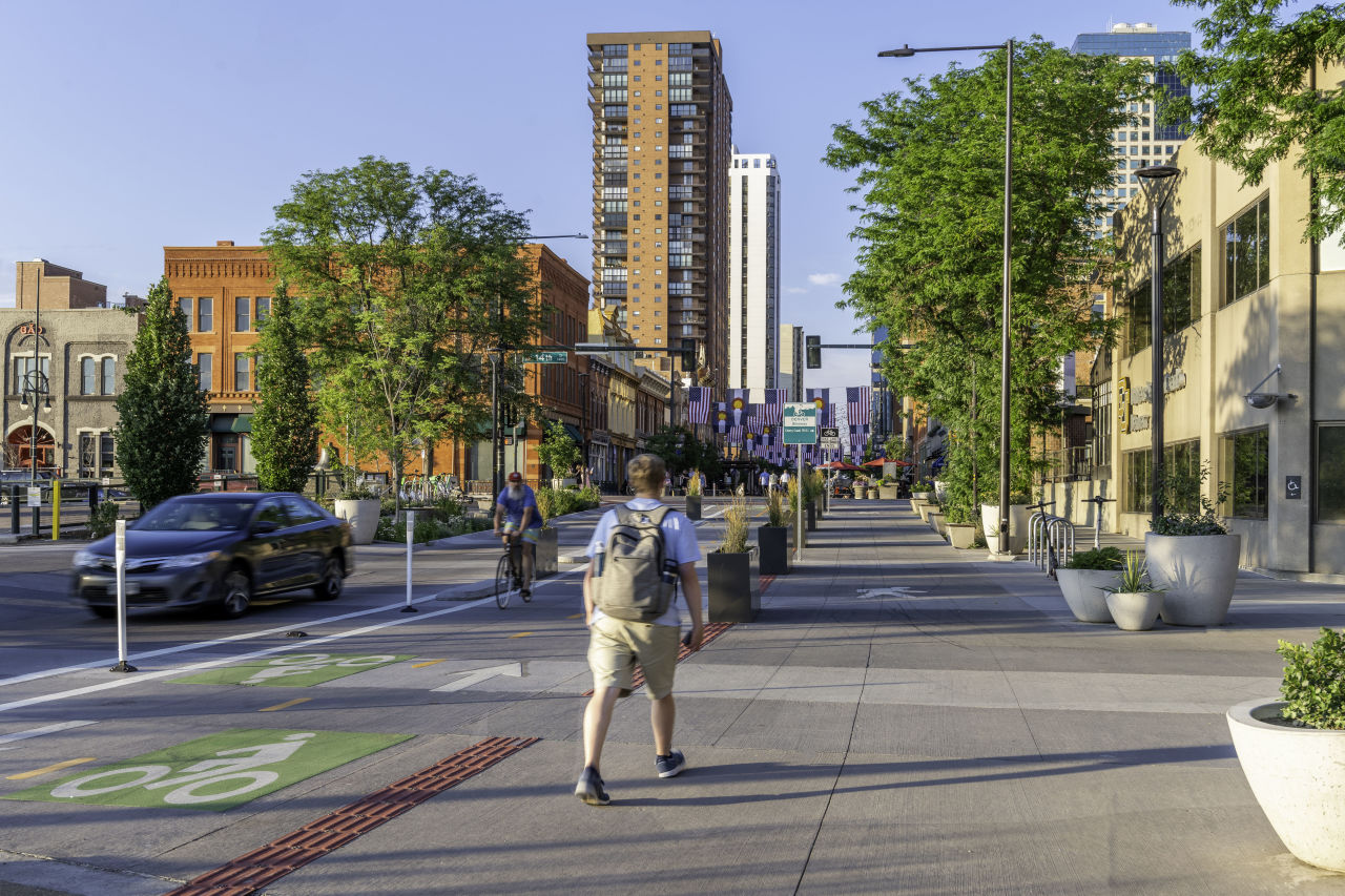 The City and County of Denver has repurposed space on the bridge over Cherry Creek to provide a wider pedestrian and bicycle area.