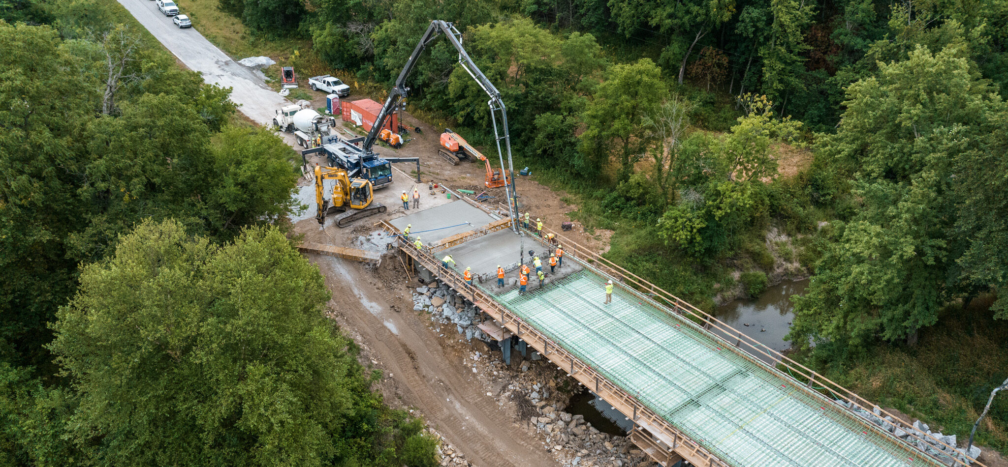 Concrete bridge deck placement on one of 31 bridges replaced in the FARM Bridge Program