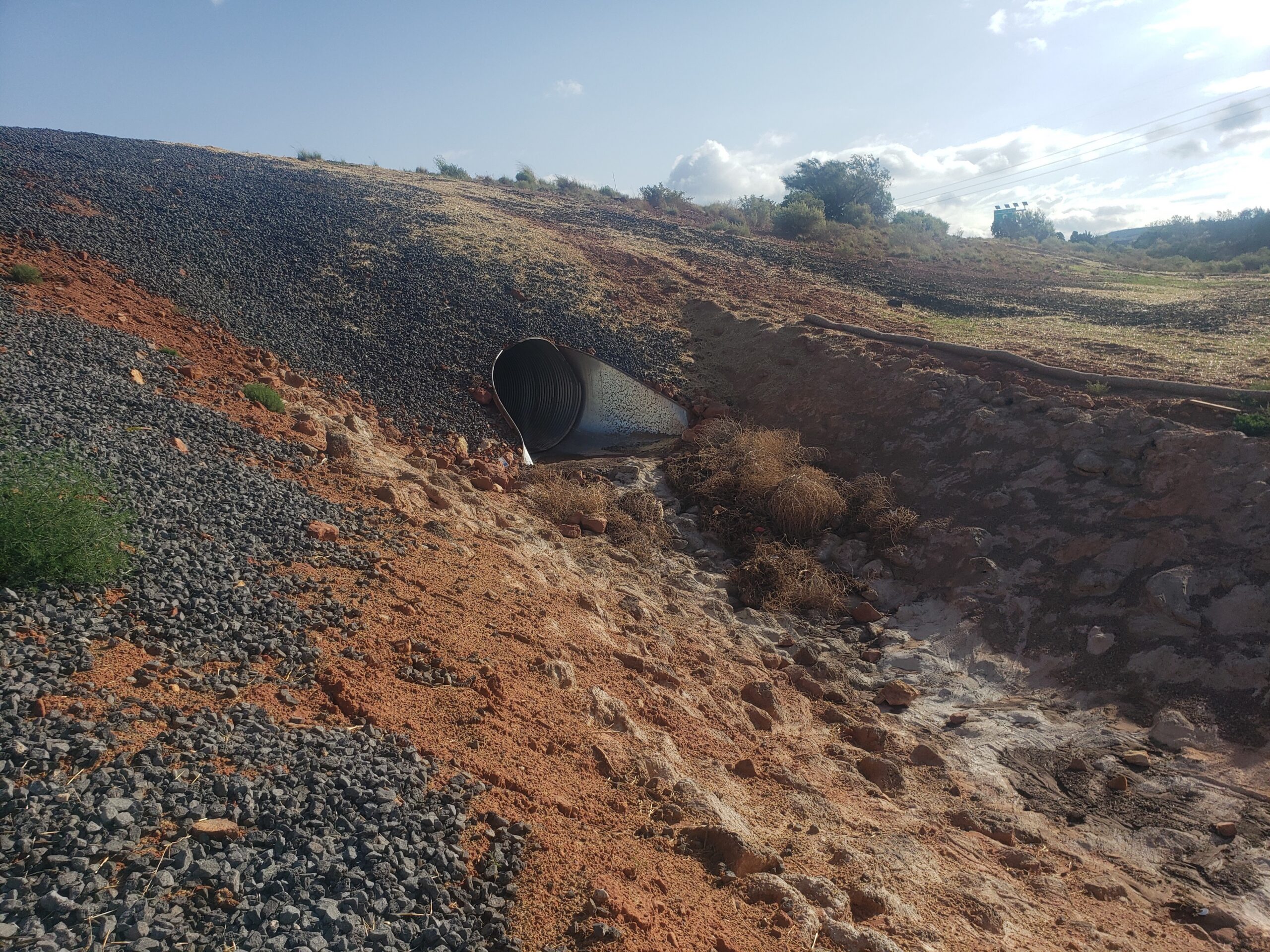 Drainage improvements included extended pipes and a parallel sub-surface storm drain system.