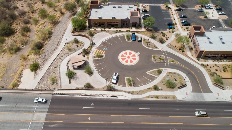 Wilson & Company designed the spoked wheel-inspired parking lot at the New River Trailhead.